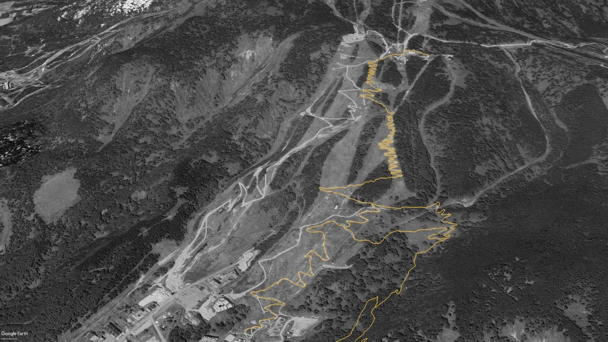 Aerial view of Grand Hirafu in 2024 with the bike park open and NAMBA's first connector trails (Kings High, Key Path) pushing toward Twin Peaks