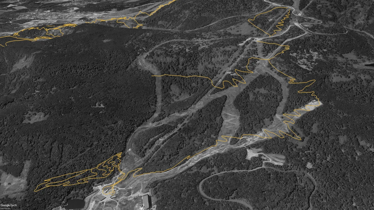Aerial view showing the full Hanazono build vision: the expanded flow trail, additional forest progression lines, and a green loop trail at the top of the Hana1 lift