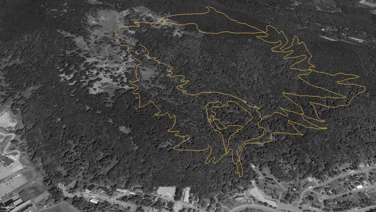 Aerial view of Twin Peaks in 2023 with the trail network expanded to 10.4km and the park opened to the public