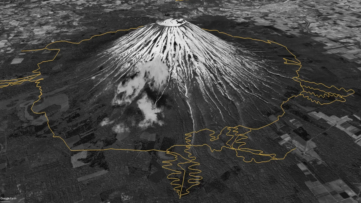 Aerial concept view of Mt Yotei with the planned Yotei 360 loop traced in gold around the volcano's base